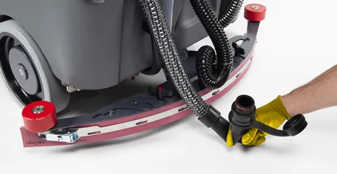 E85 industrial scrubber-dryer with flexible drain hose