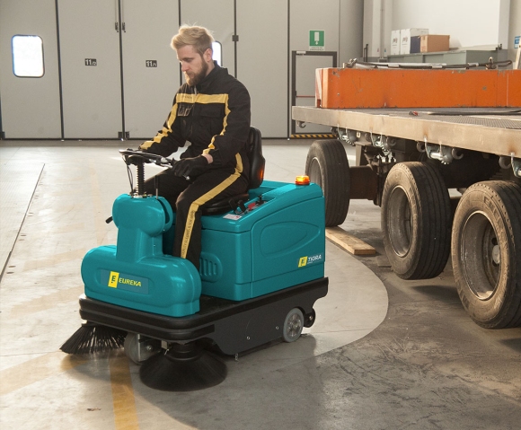 Tigra ride-on sweeper for cleaning the workshop